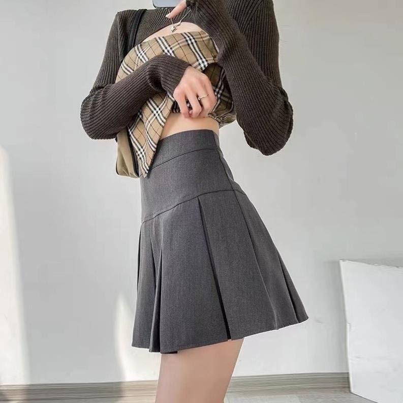 Váy xếp ly - Xẻ tà xếp ly: tinh tế, gợi cảm vừa đủ Váy xếp ly - Xẻ tà xếp ly: tinh tế, gợi cảm vừa đủ